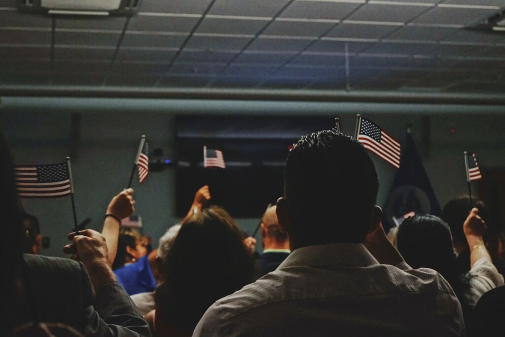 Asylum seekers waiving the American flag after being granted asylum.