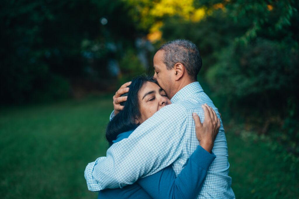 Couple reunites after successful family petition.